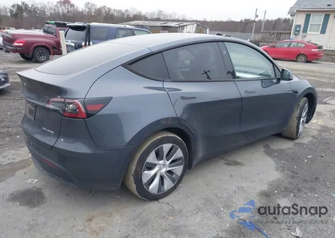 2023 Tesla Model Y Awd/Long Range Dual Motor All-Wheel Drive z USA, uszkodzony, nr VIN 7SAYGDEE7PA147714